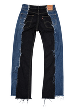 Le Pétite Jean L28 W26 jeans showing classic denim fabric with a slim fit cut and five-pocket design.