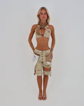 Beige Le Pétite Jean After Hour Jorts denim shorts with distressed details and frayed hem, casual summer style.