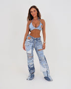 Le Pétite Jean The Original Denim Bralet featuring a stylish denim design and adjustable straps, displayed on a neutral background.