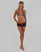 Le Pétite Jean Desert Muse bikini top featuring a stylish, patterned design with adjustable straps and a flattering fit.